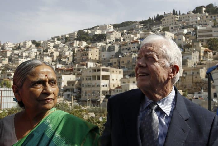 Delegates of The Elders group of retired prominent world figures: Indian activist Ela Bhatt, left, and former U.S. President Jimmy Carter.