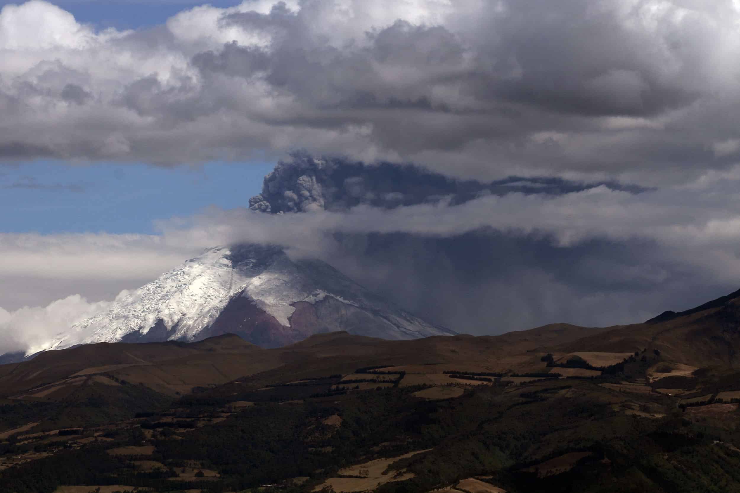 View of Cotopaxi Volcano spewing ash from Quito, Ecuador on August 22, 2015.