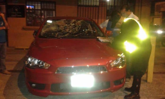 A photo of a Mitsubishi Lancer that was damaged by vandals on the evening of Aug. 21 in Costa Rica, reportedly because the driver was working with the ride-hailing service Uber.