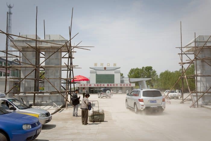 Cars are seen entering a border crossing with North Korea in Quanhe, Jilin province, China.
