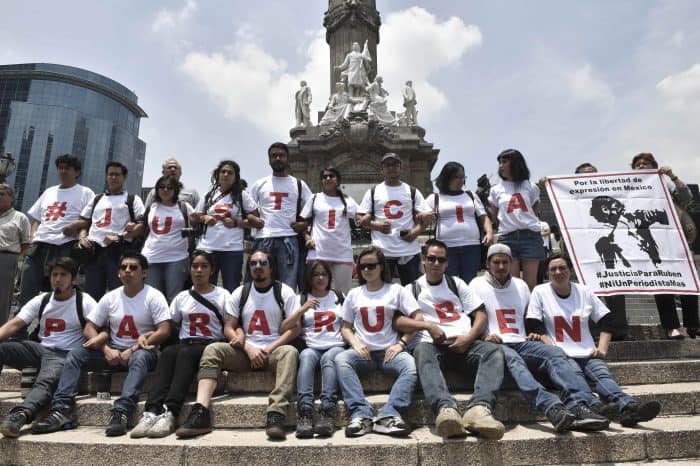 Photojournalists protest with T-shirts that say "Justice For Rubén" in Mexico City, on Aug. 16, 2015. 
