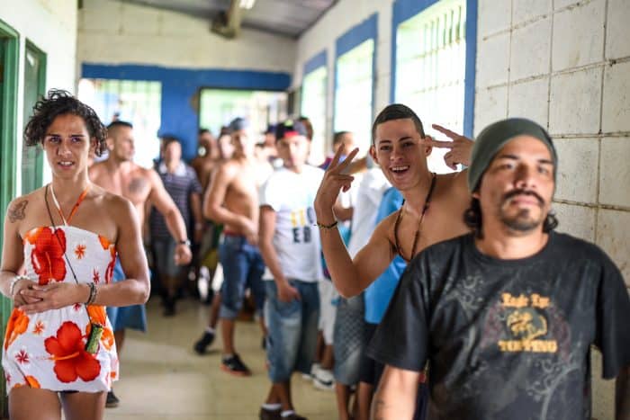 A transgender inmate shares the same communal space with male prisoners at La Reforma prison.