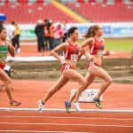 Rachel Schneider and Shelby Houlihan lead the way in women's 1,500 meter run at the NACAC Championships in San José on Saturday, August 8, 2015.