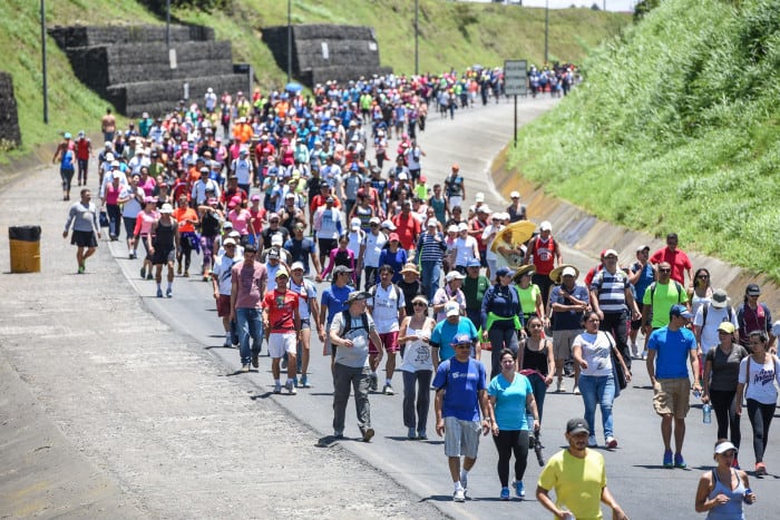 Travelers head towards Cartago on Saturday, Aug. 1 to get to the Basílica de los Ángeles.