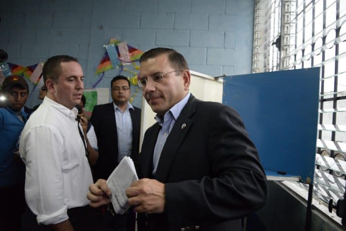 Guatemalan presidential candidate for the Renewed Democratic Liberty Party, Manuel Baldizón, right, votes in Petén, 580 km north of Guatemala City, on Sept. 6, 2015. 