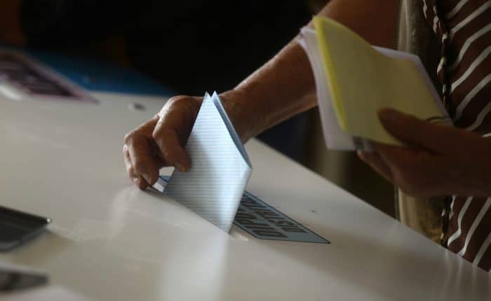 A woman casts her vote at a polling station in Mixco, 19 km from Guatemala City, during general elections on Sept. 6, 2015.
