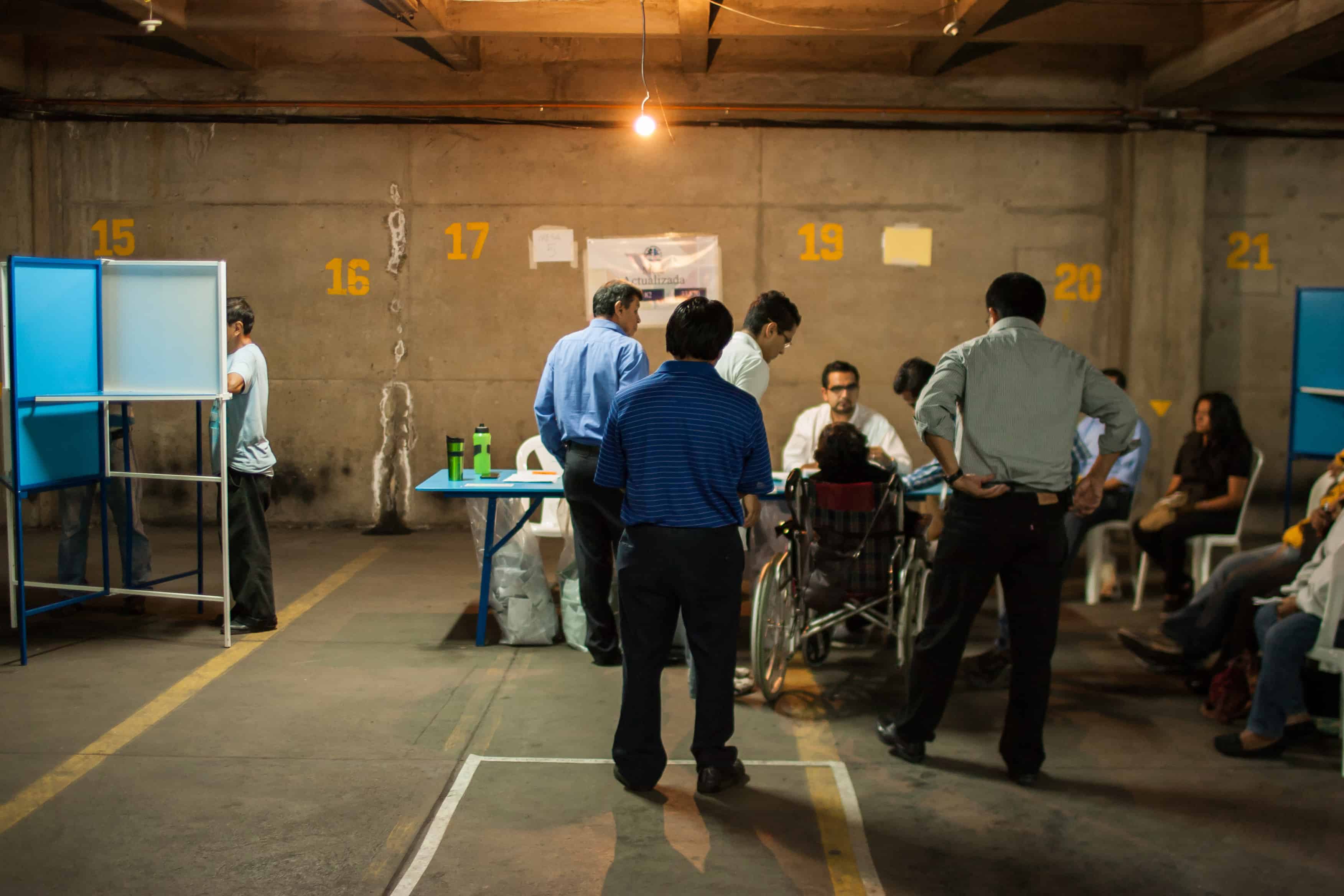 Disillusioned voters cast ballots Sunday, Sept. 6, 2015 in Guatemala in order to have the right to protest later.