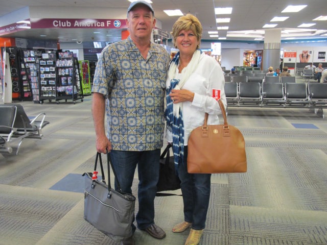 Bernardo and María Perdices at the Miami International Airport Friday, ready to catch a flight to Santiago, Cuba.