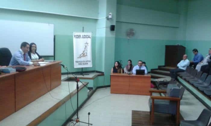 U.S. citizen Ann Patton, center, listens as judges find her not guilty of murder, in a Pérez Zeledón courtroom in Costa Rica on Sept. 7, 2015.