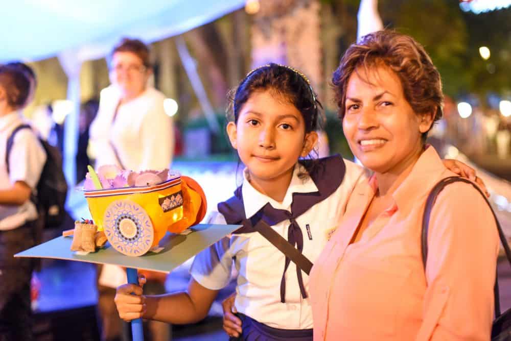 Children and families excitedly watching the Torch of Independence as it arrives in Costa Rica, continuing its journey through Central America