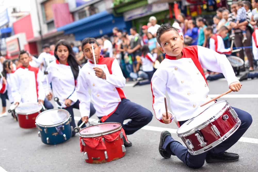 A school marching band performing vibrant tunes as part of Costa Rica’s Independence Day celebrations in San José.