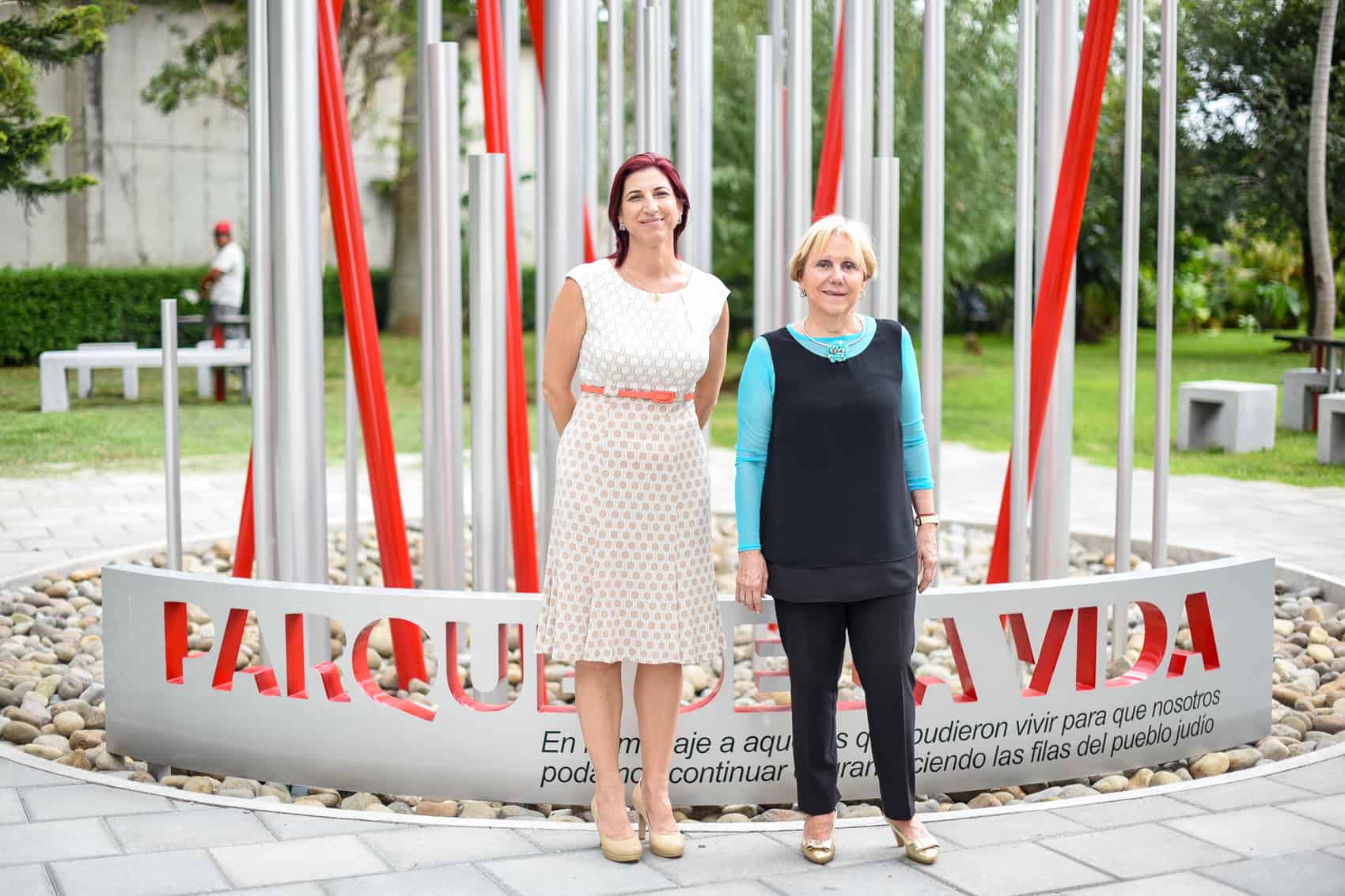 From left, volunteer Silvia Paz and Vilma Faingezicht, director of the Jewish Community Museum, pose in front of the Parque de la Vida monument, created by architect Alberto Reifer.