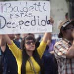 Demonstrators hold signs during a protest against Guatemala's former President Otto Pérez Molina and former Vice President Roxana Baldetti.