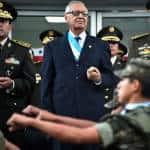 Guatemalan President Alejandro Maldonado Aguirre (C) receives militar honors during a ceremony at the Defense Minister in Guatemala City on September 4, 2015. Guatemala's Congress swore in vice president Alejandro Maldonado as head of state Thursday after his former boss Otto Perez resigned amid a firestorm of corruption allegations.