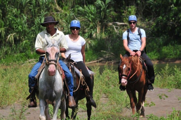 Tourists horseback riding