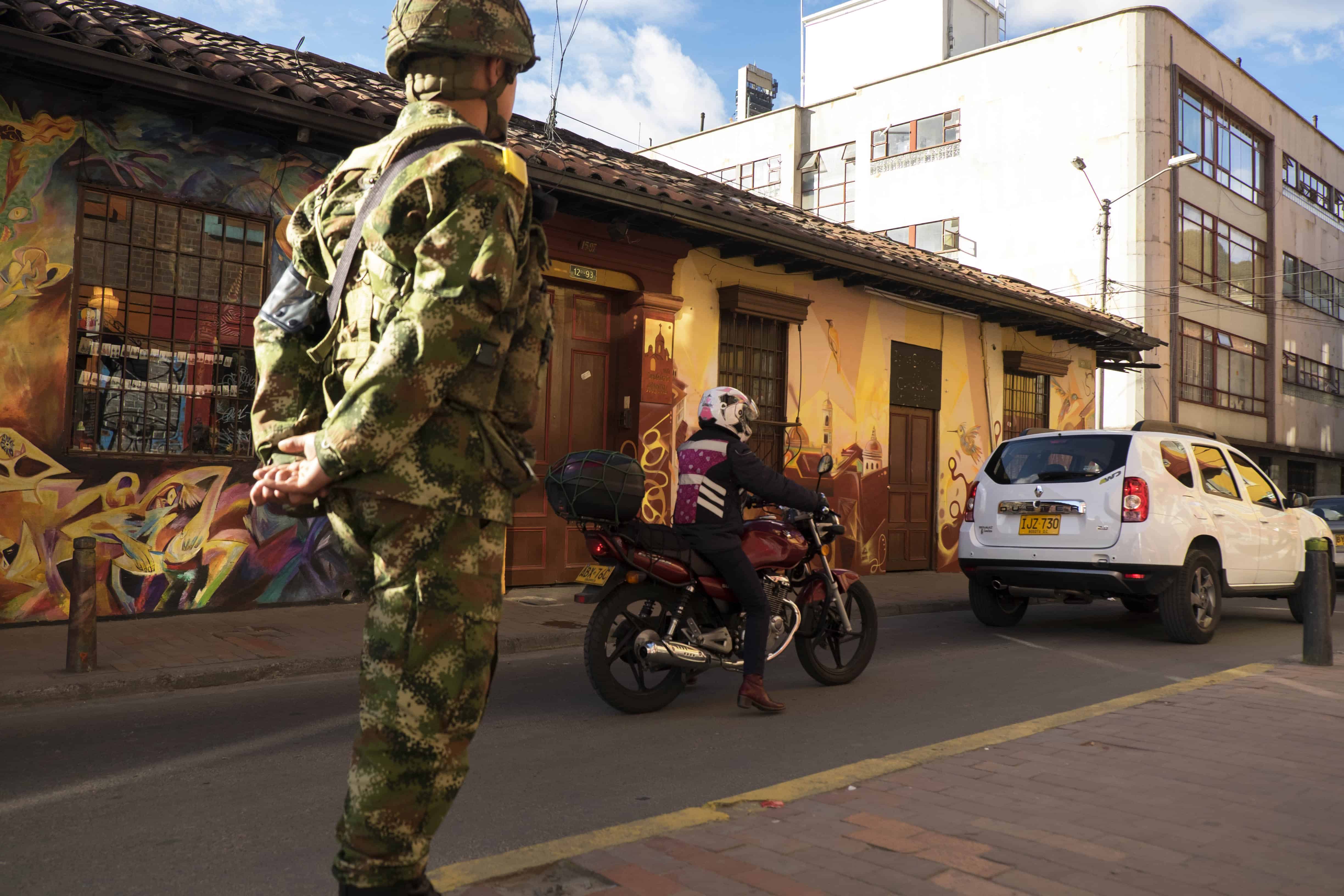 Colombia military: A soldier walks through the touristic area of Candelaria, Bogota.
