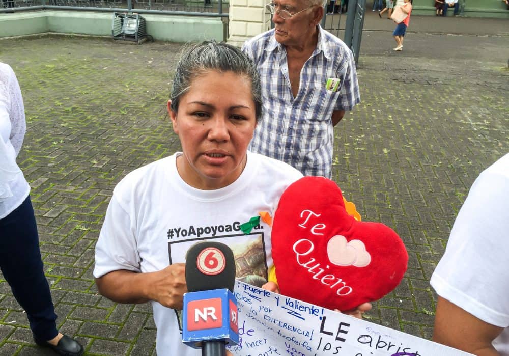 Gerardo Cruz mother, Ana Patricia Barquero, talks to the press outside the Desamparados Church, Saturday, November 21.