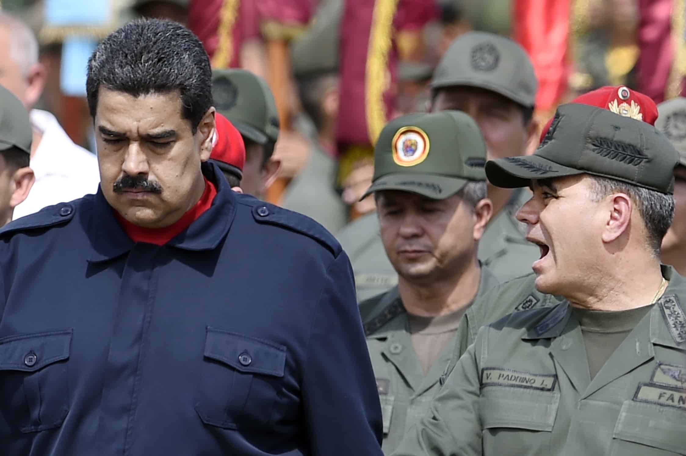 Venezuela President Nicolás Maduro, left, walks with Venezuelan Defense Minister Padrino López