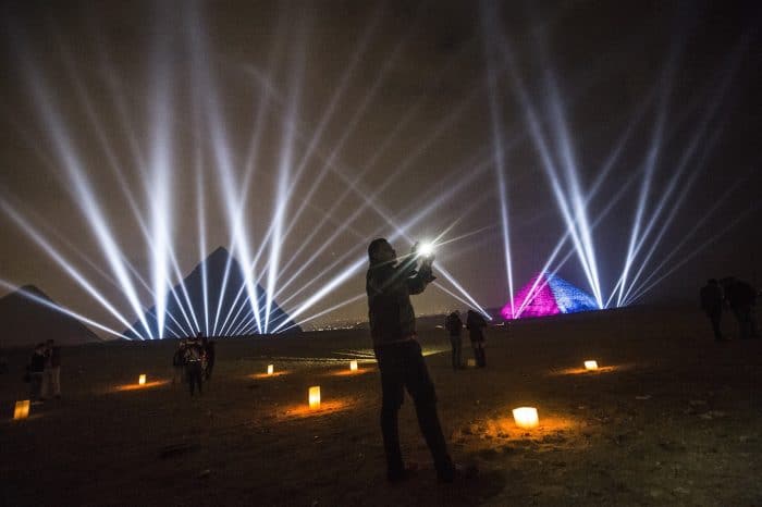 Egyptians celebrate the New Year in front of the pyramids