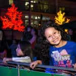 Camilia Rojas, 10, enjoyed the music under the Christmas tree outside San José's Children's Hospital.