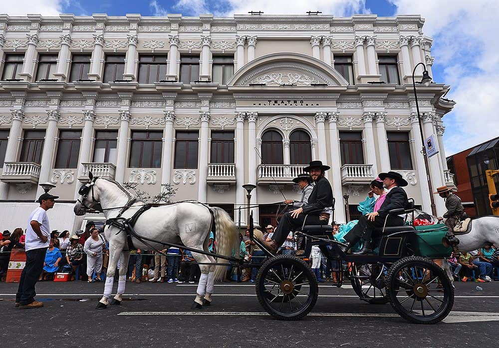 Colorful horse parade featuring thousands of riders at Costa Rica's tope event.
