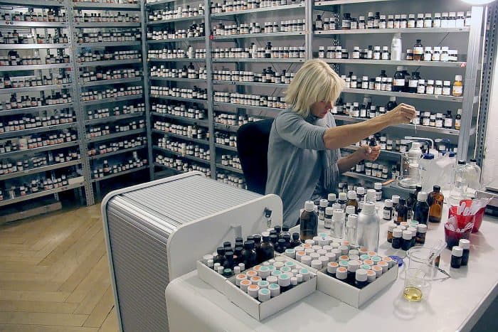 Sissel Tolaas working on her odor collection. [Courtesy of FID]