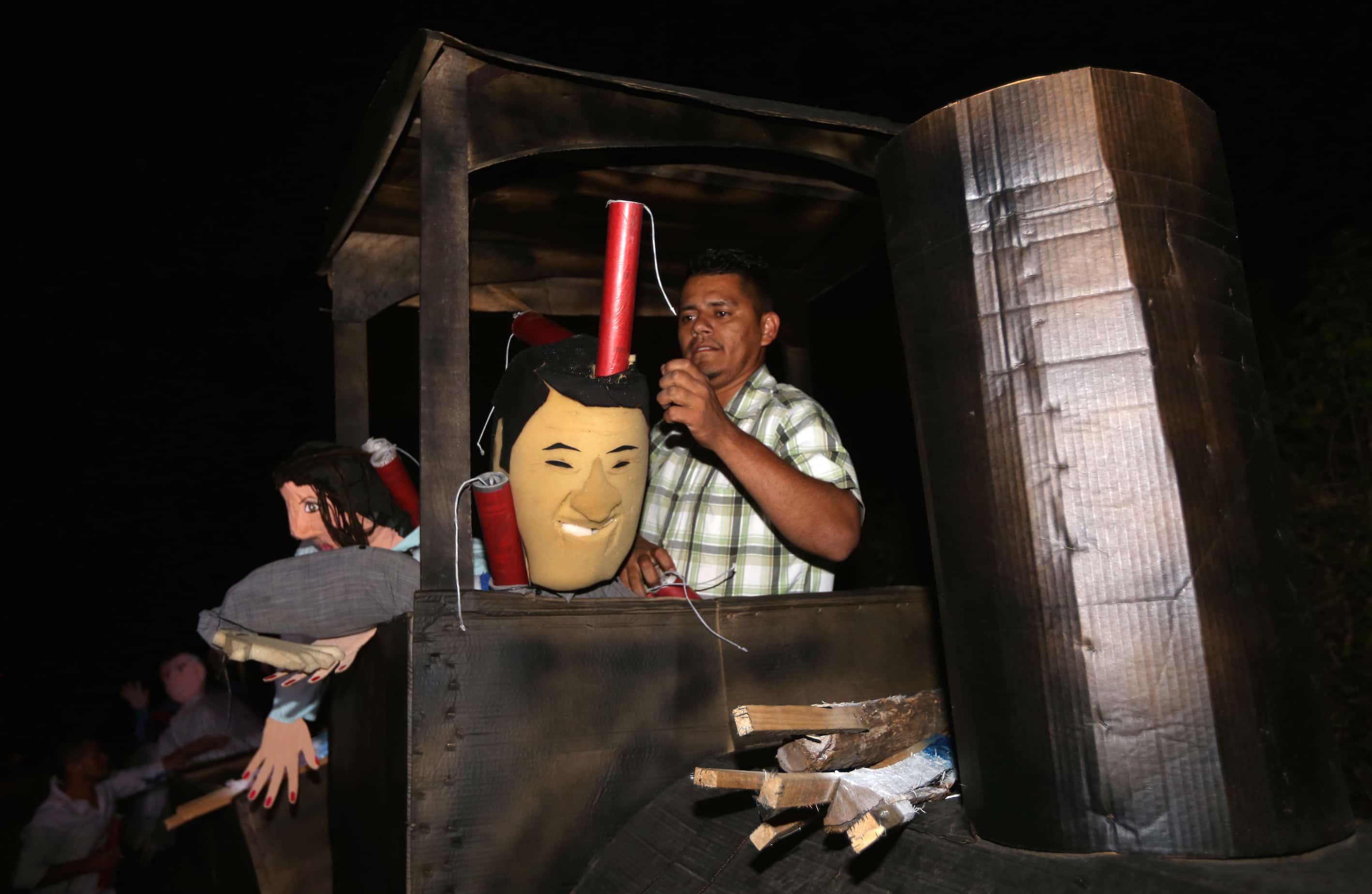 a dummy depicting Honduran President Juan Orlando Hernández