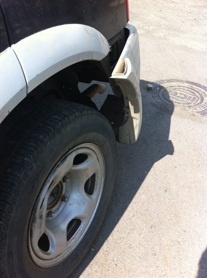 Problem: Tire is replaced but bumper is sticking out.