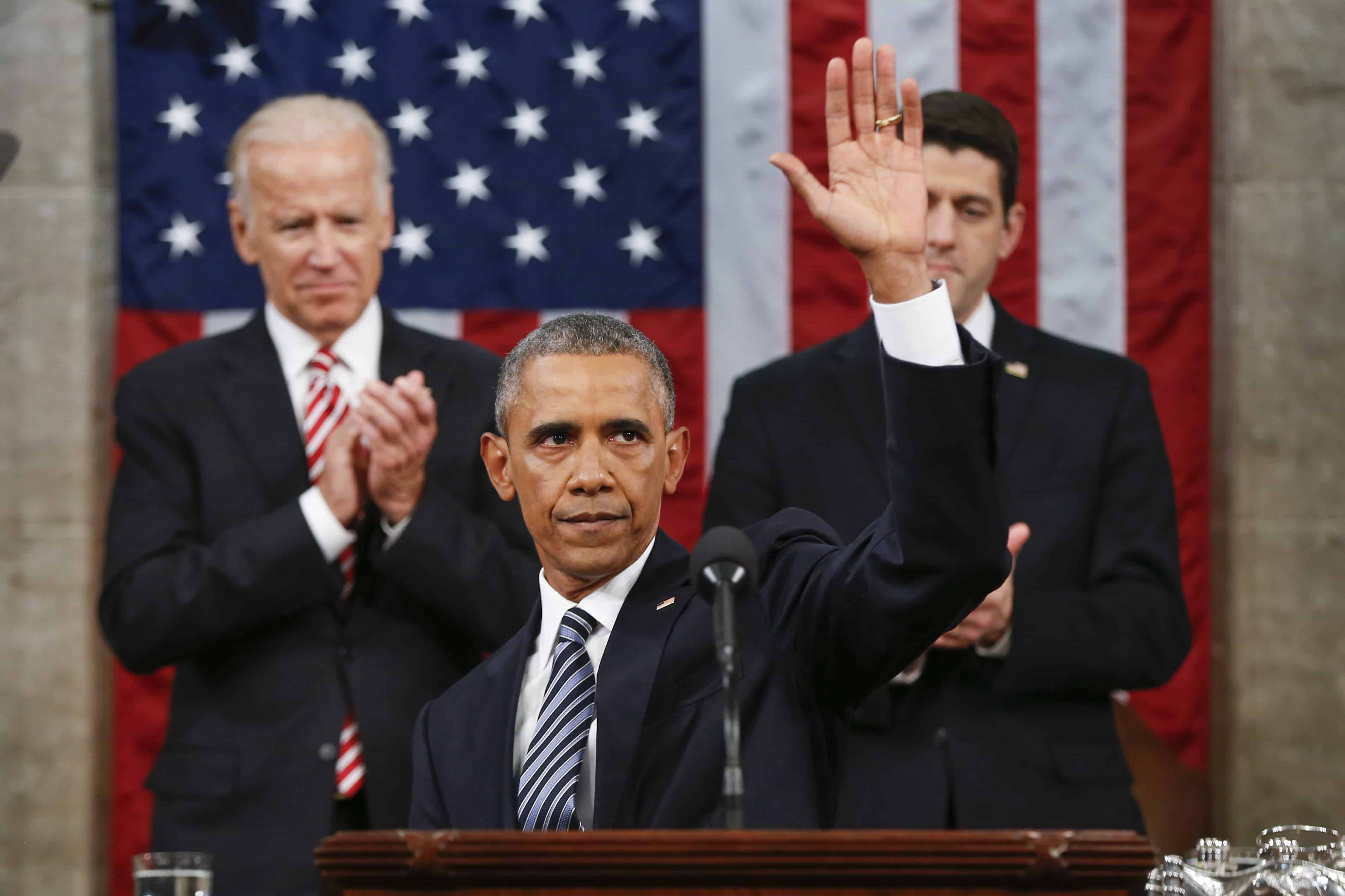 U.S. President Barack Obama waves at the conclusion of his State of the Union address