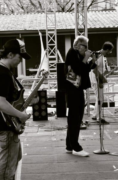 Rooftop concert? The Blind Pigs belt it out, with Dave Scott front and center.