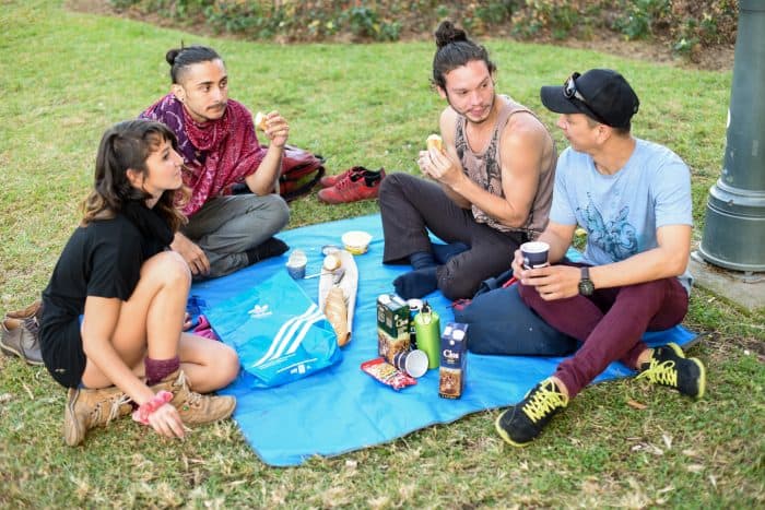 A group of friends enjoys a picnic. Alberto Font/The Tico Times