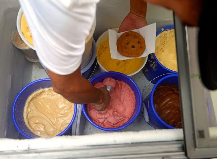 Galway ice cream employee scoops ice cream