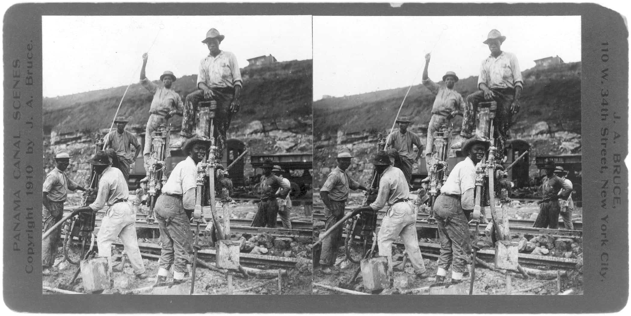 April 1910 stereographic file photo shows Panama Canal workers using tripod drills during construction of the canal.