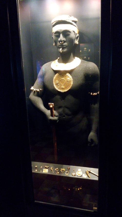 Representation of indigenous man wearing gold to denote his rank.