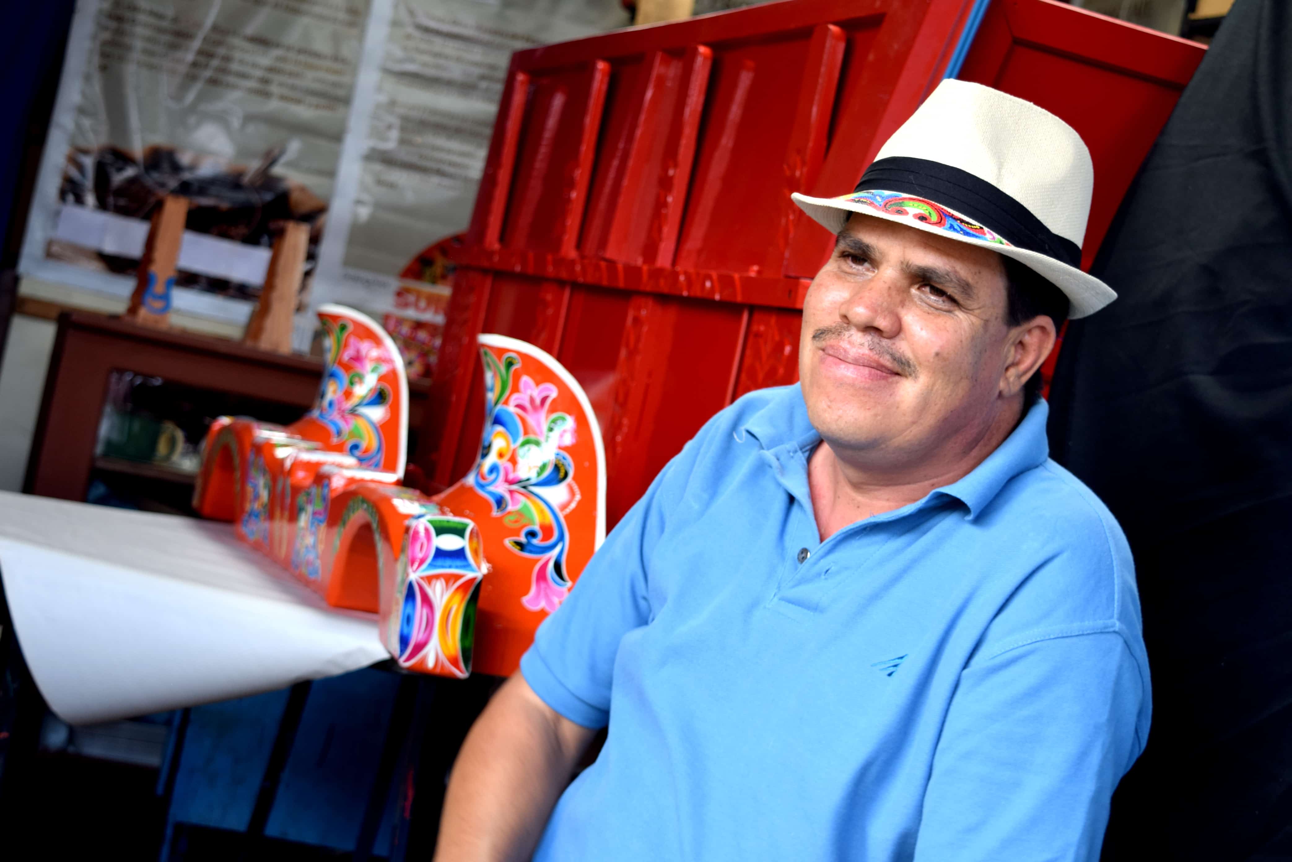 Luis Madrigal depicts the Costa Rican identity through the use of bright colors and shapes on the oxcarts.
