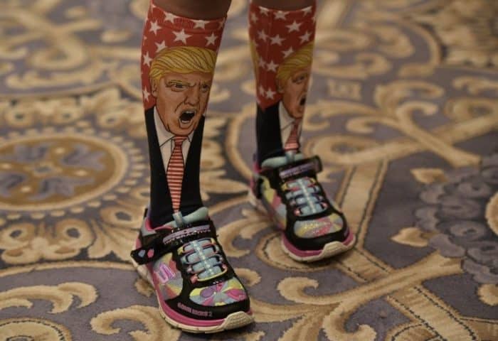 A Donald Trump supporter wears socks featuring the candidate, Washington, DC, September 2016.