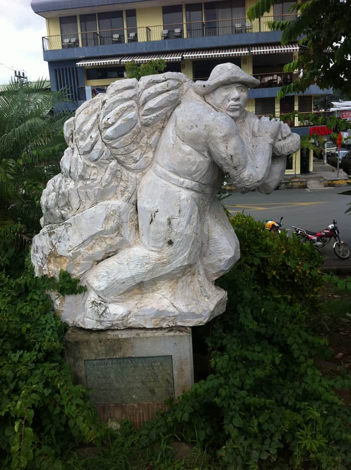 A sculpture along the Quepos malecón recalls the era when this was a banana town.