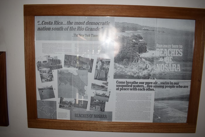 A 1972 ad advertising the "BEACHES OF NOSARA," displayed on the wall at RE/MAX First Choice Realty.