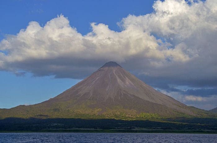 Arenal Volcano viewed from the lake of the same name.