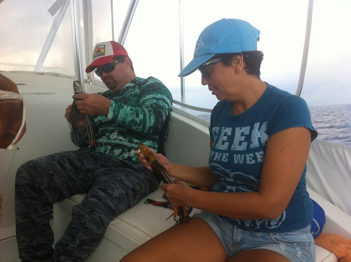 Oscar and Guiselle check the footlong lures, which didn't work today.