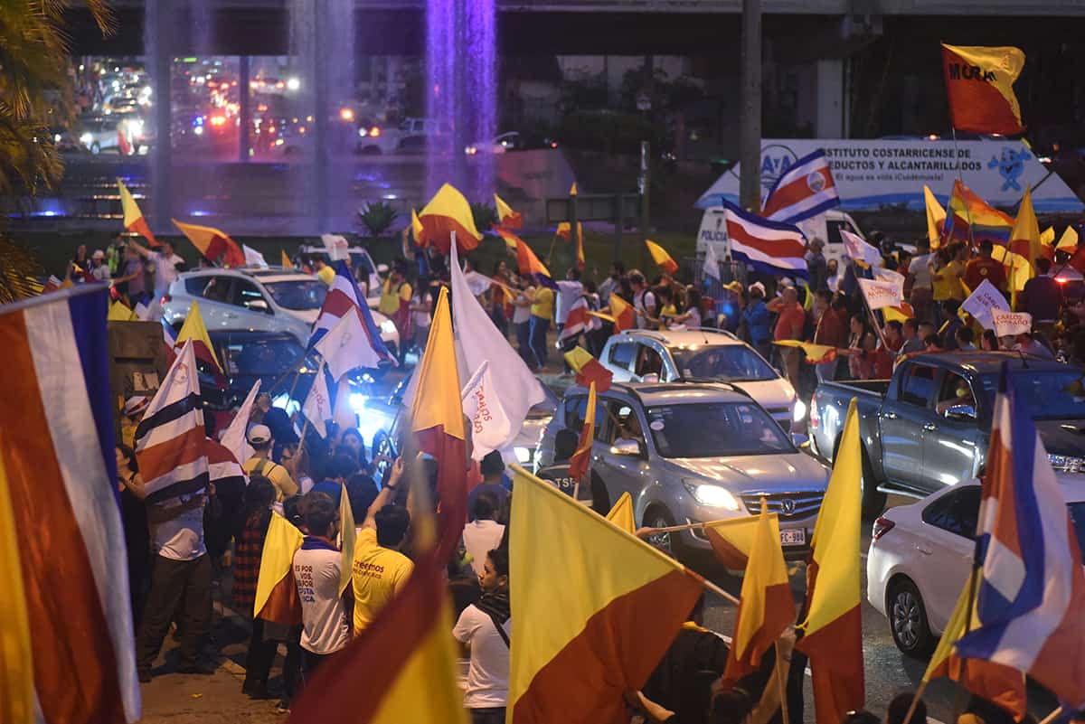 Costa Ricans celebrate ahead of its April 1 presidential runoff elections.