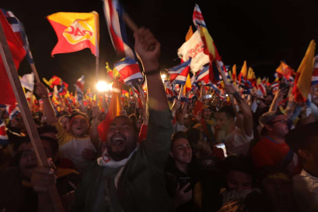 Supporters of Carlos Alvarado celebrate at the Plaza Roosevelt when the results are announced.