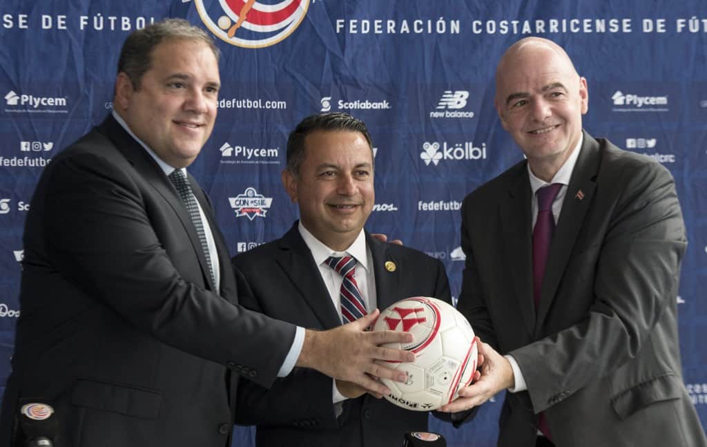 FIFA president Gianni Infantino (R), the president of the Costa Rican Football Federation (FEDEFUTBOL) Rodolfo Villalobos (C) and the president of CONCACAF Victor Montagliani