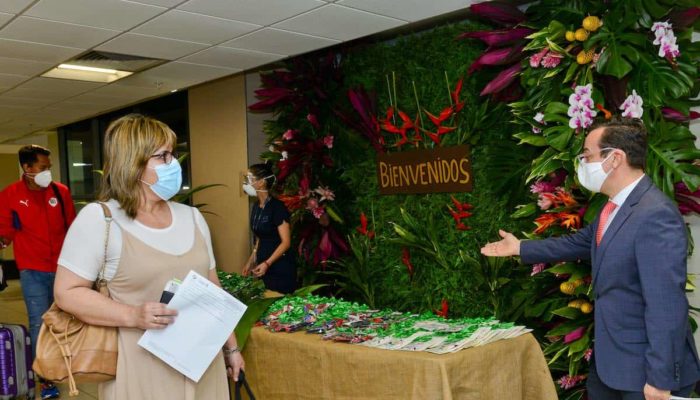 Tourists received welcome gifts after disembarking the flight from Spain.