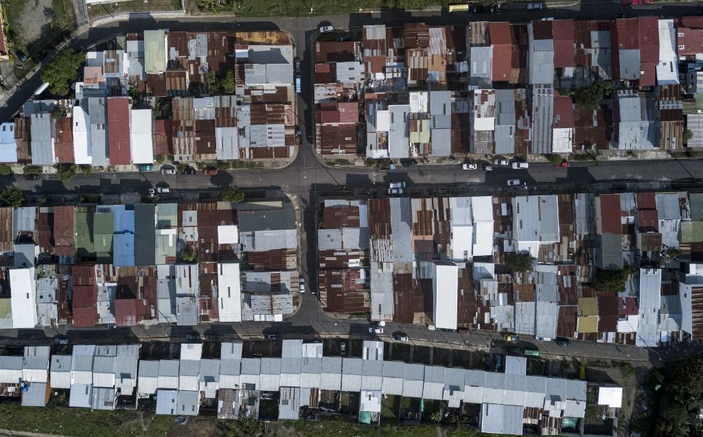 (FILES) Aerial file photo taken on May 23, 2020 of a poor neighborhood of San Jose, amid the COVID-19 coronavirus pandemic.