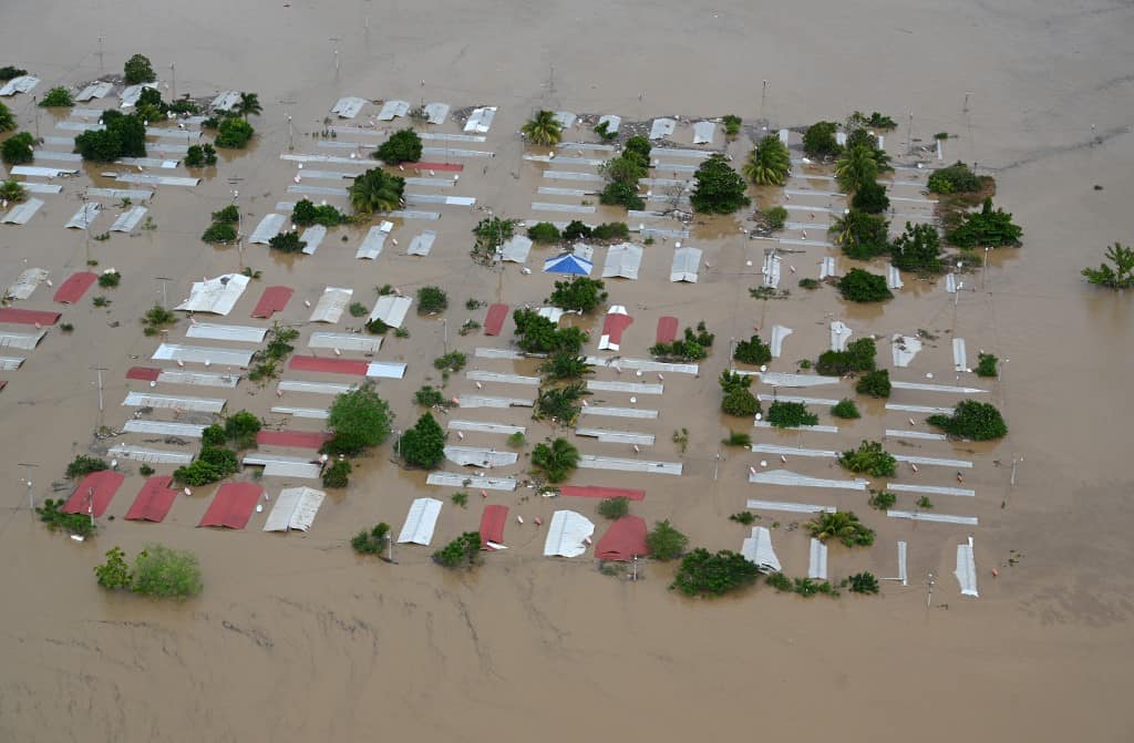 Aerial view an area around San Pedro Sula, 240 km north of Tegucigalpa, flooded by the overflowing of the Chamelecon river after the passage of Hurricane Iota, taken on November 18, 2020.