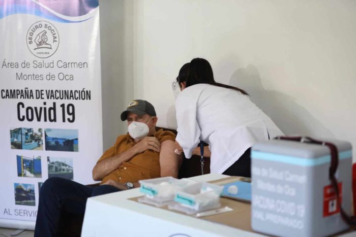 Jorge De Ford, 72, receives the coronavirus vaccine on December 24, 2020.