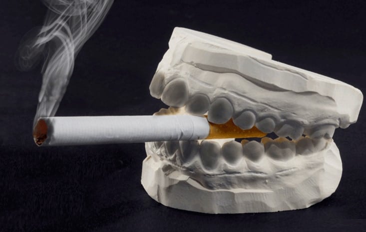 Heavy smokers and drinkers are at higher risk of oral cancers.