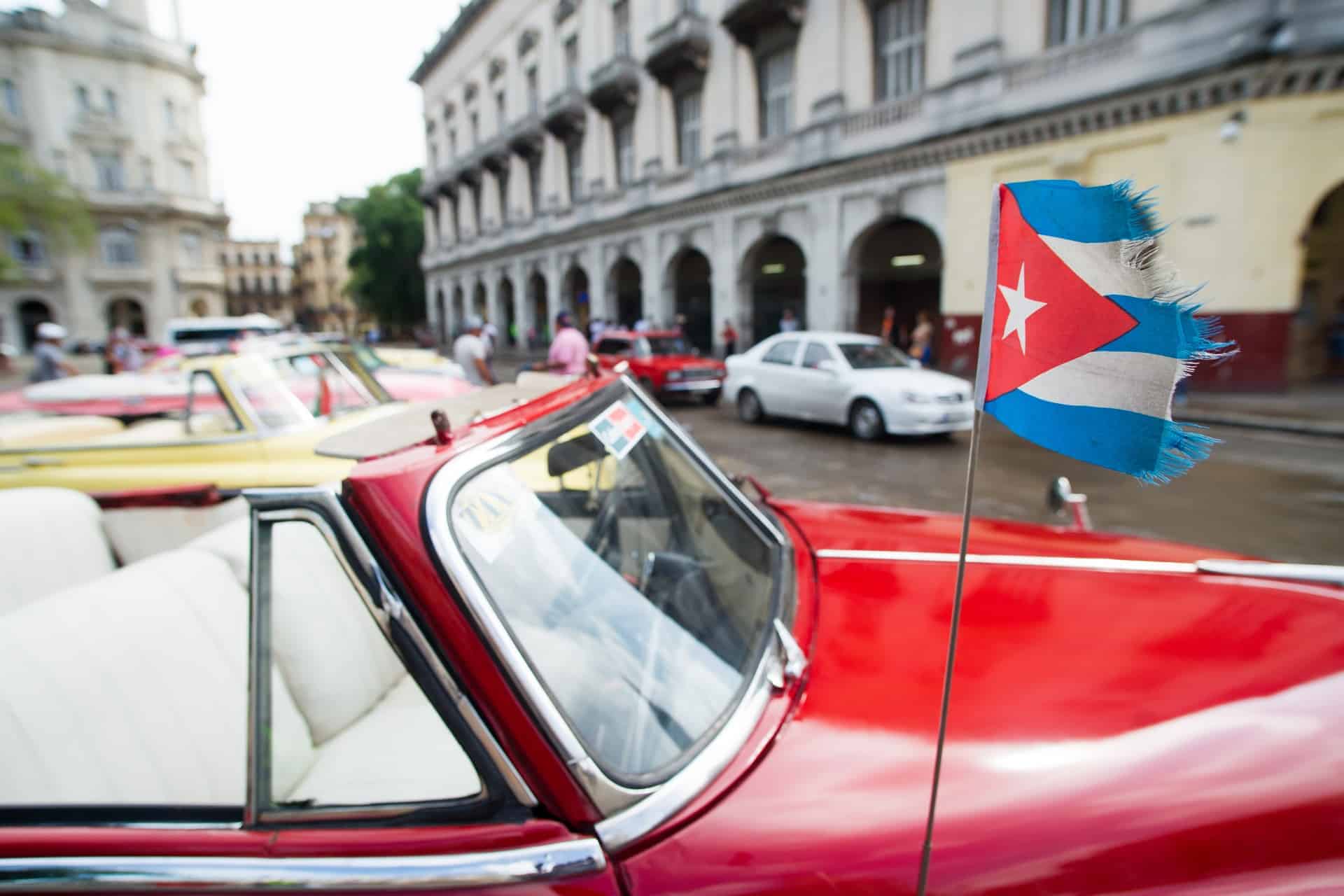 The Cuban flag on a car in Havana.