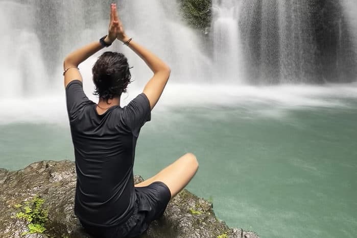 Costa Rica Tourist at a waterfall